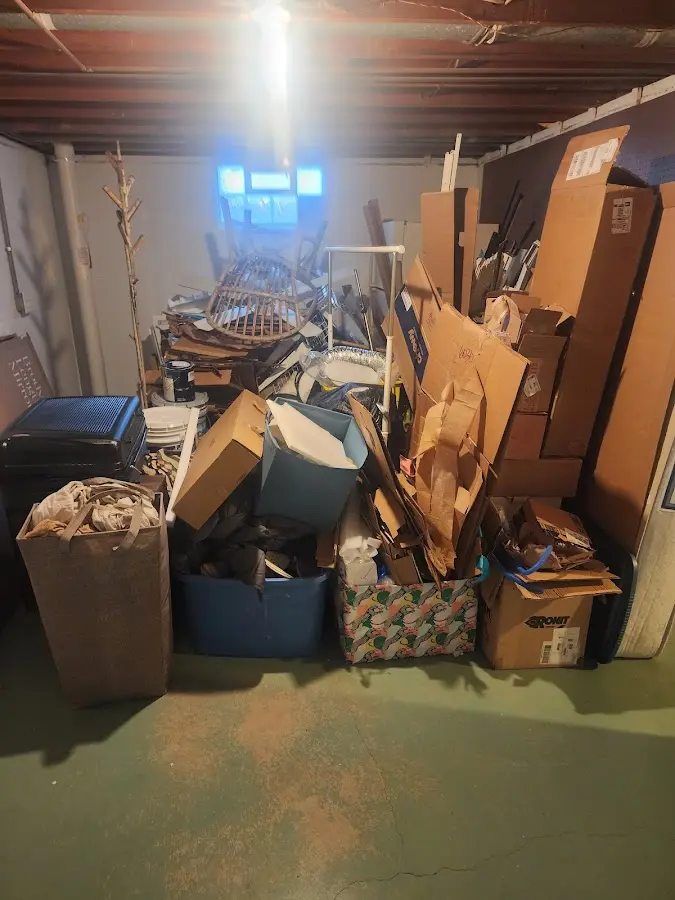 Roll-off dumpster container at job site for 4 Yard Dumpster Rental in Clyde